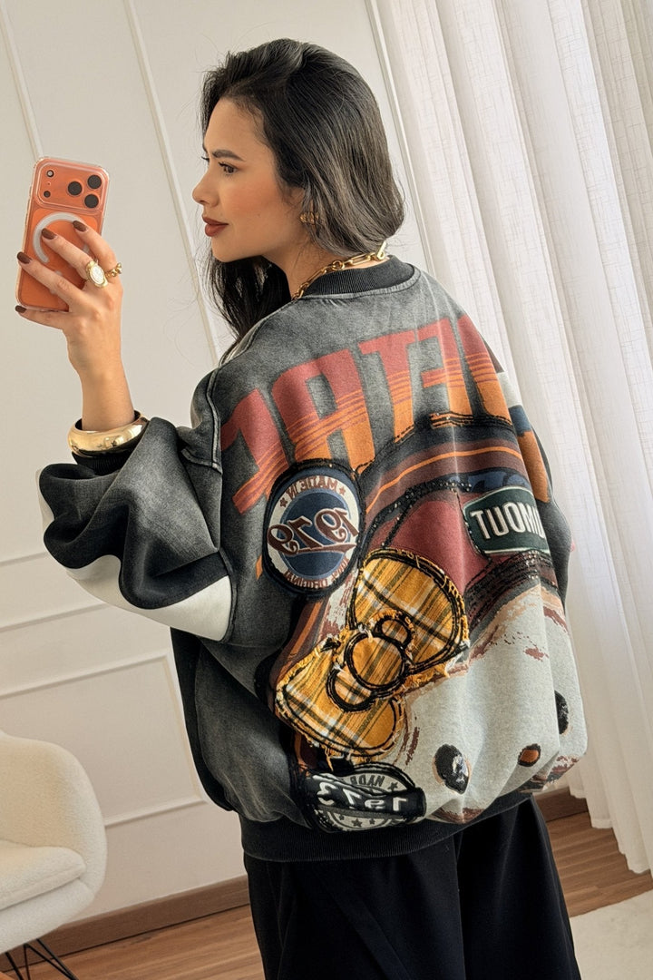 Kabát potiskem „Hello Kitty”